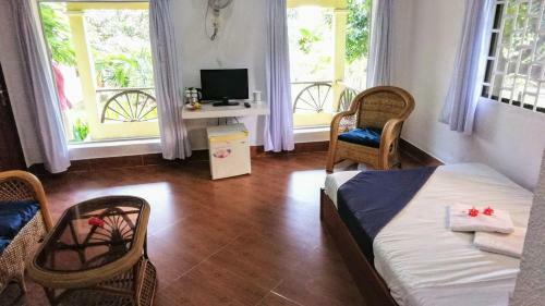 Hostal Q Bungalows