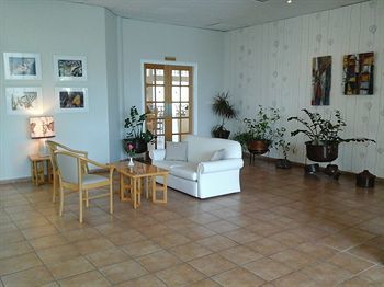 Natura Beach Hotel & Villas
