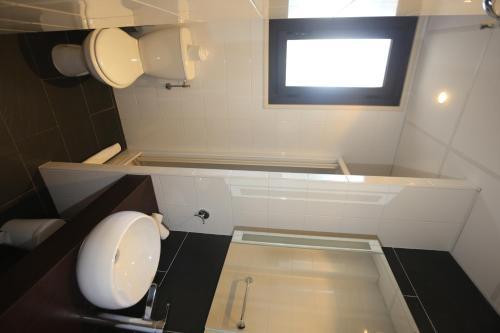 Apartamento O'sullivans Bar And Hotel