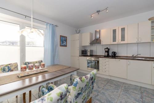 Apartamento Am-yachthafen-villa-fehmarn-wohnung-38-586