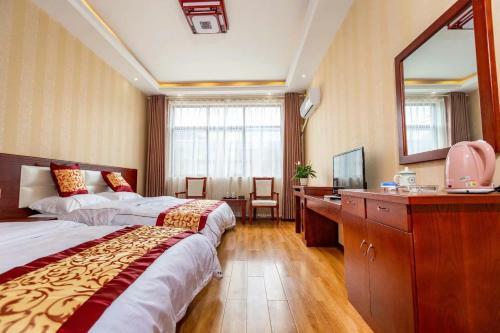 Lijiang Yi Jia Hostel By The Airport