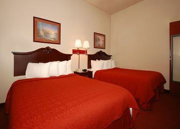 Hotel *quality Suites*