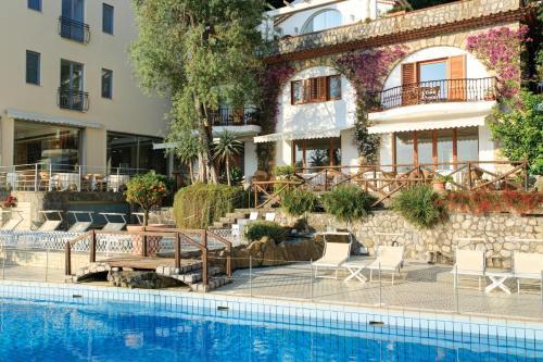 Hostal Via Capo Rooms