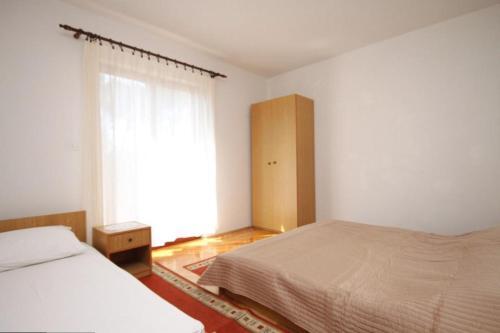 Apartment Vrboska 8748a