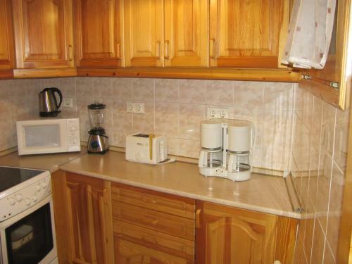K�roly Apartments