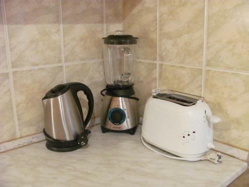 K�roly Apartments