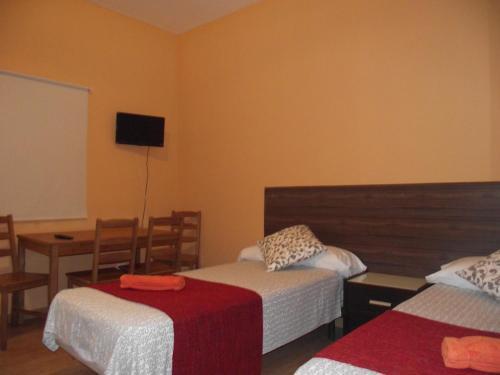 Hostal Village Rooms Multicolor