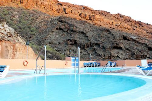 Luxury African Apartment With Pool In Taurito, Mog�n.