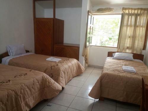 Hostal Cattleya Hospedaje