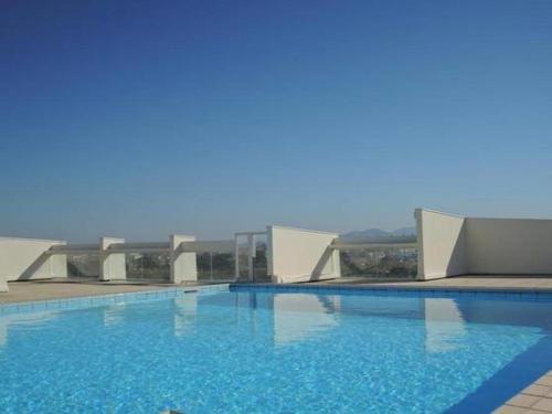 Apartamento Studio And Rooftop Pool With A View