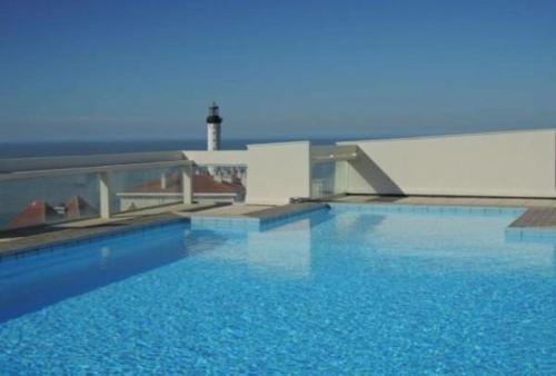 Apartamento Studio And Rooftop Pool With A View