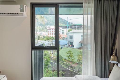 Apartamentos The Deck Patong By Favstay