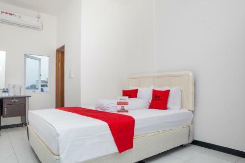 Hostal Reddoorz Near Telkom Corporate University