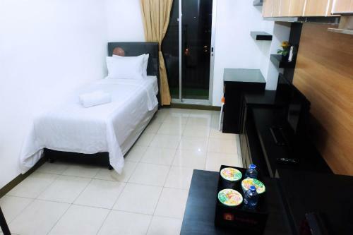 Apartamentos Cozy Studio Gading Greenhill By Travelio