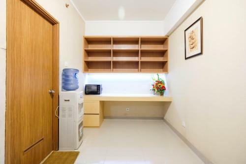 Comfortable 1br The Oasis Lippo Cikarang Apartment By Travelio