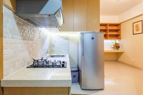 Comfortable 1br The Oasis Lippo Cikarang Apartment By Travelio