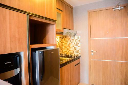 Comfortable Studio The Oasis Lippo Cikarang Apartment By Travelio