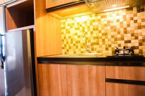Comfortable Studio The Oasis Lippo Cikarang Apartment By Travelio