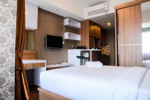 Comfortable Studio The Oasis Lippo Cikarang Apartment By Travelio