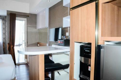 Comfortable Studio The Oasis Lippo Cikarang Apartment By Travelio