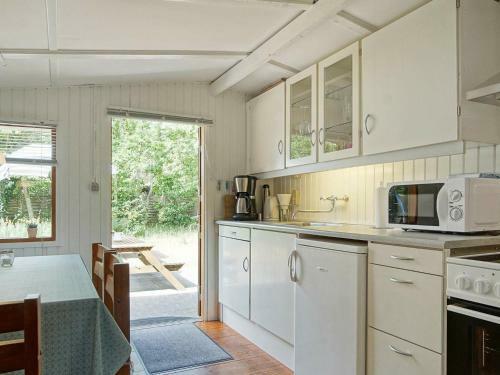 Holiday Home Nex� X