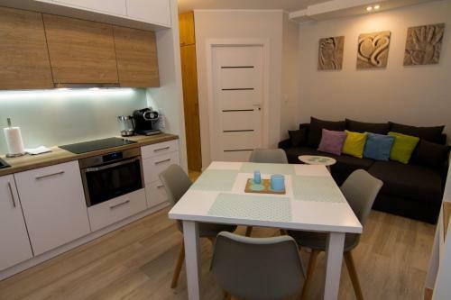 Apartamenty ?winouj?cie - Kwarta? R�?y Wiatr�w
