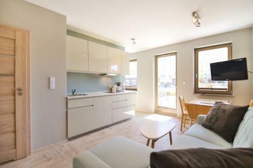 Apartamenty ?winouj?cie - Kwarta? R�?y Wiatr�w