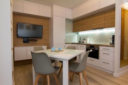 Apartamenty ?winouj?cie - Kwarta? R�?y Wiatr�w