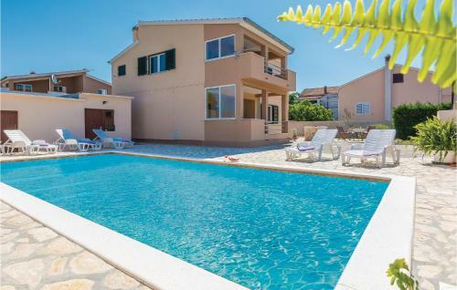 Four-bedroom Holiday Home In Vrsi