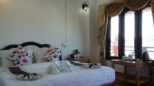 Houayxai Riverside Hotel (phonevichit Guesthouse)