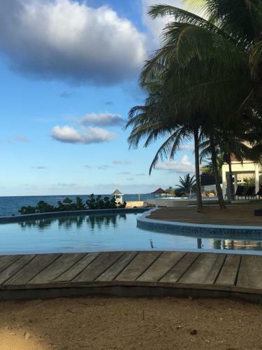 Apartamento Whispering Seas - 2 Bedroom Luxury Ocean Front Condo