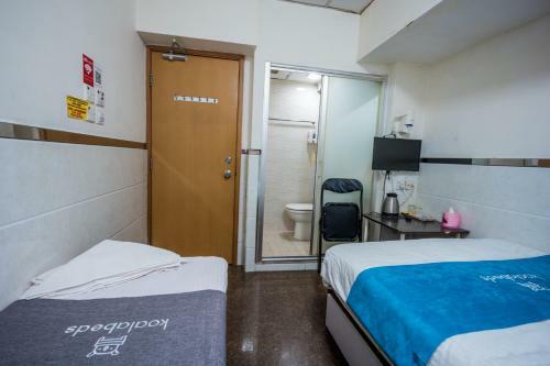 Hostal Qian Yue Inn (managed By Koalabeds Group)