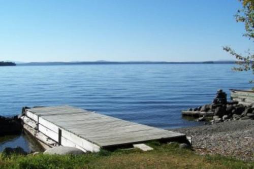 Rustic Camp On Water's Edge
