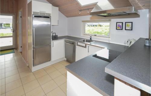Four-bedroom Holiday Home In Lokken