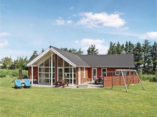 Four-bedroom Holiday Home In Lokken