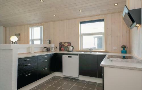 Four-bedroom Holiday Home In Lokken