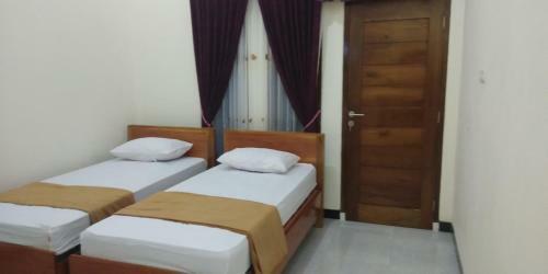 Hostal Arrys Watukarung Surfcamp