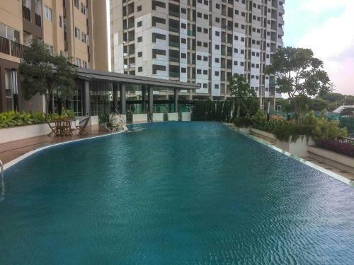 Comfy Studio The Oasis Apartment Lippo Cikarang By Travelio