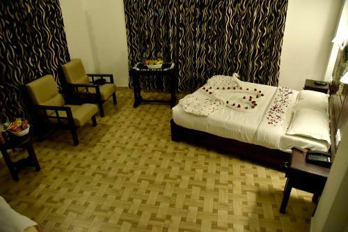 Hotel Natura Inn