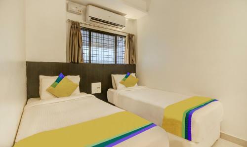 Treebo Trip Hotel Coral