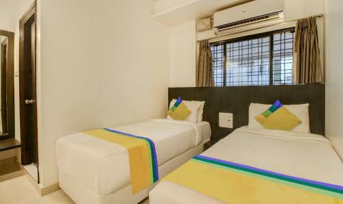 Treebo Trip Hotel Coral