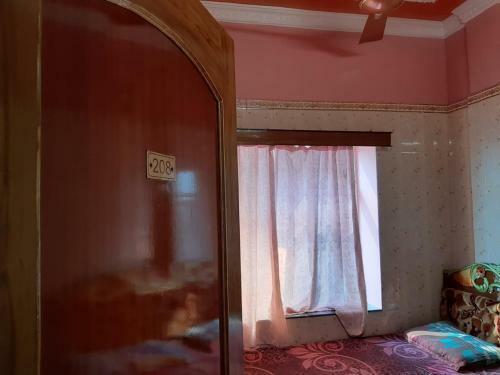 Hotel Goroomgo Sureswory Pampa Puri