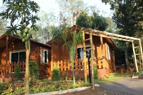 Oyo 26892 Coorg Amodhini Wood Cottage Suits