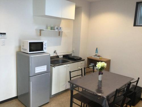 Apartamentos Keimei Guest House Rm 202