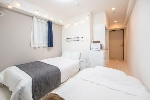 Apartamentos Naniwa Tsutenkaku Residence
