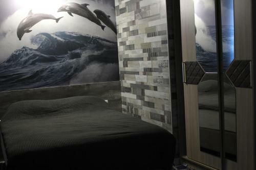 Three Dolphins Hotel