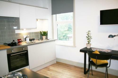 Apartamento Charming Executive Studios