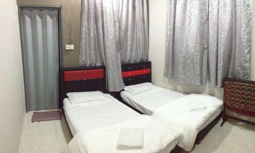 Hostal Anggun Beach Guest House