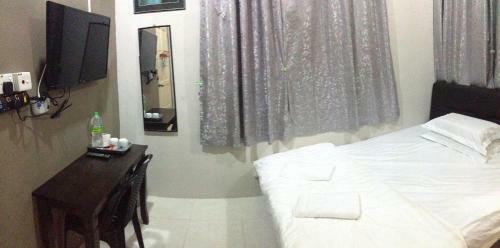 Hostal Anggun Beach Guest House