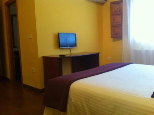 Hotel L'ermita Casa Ripo